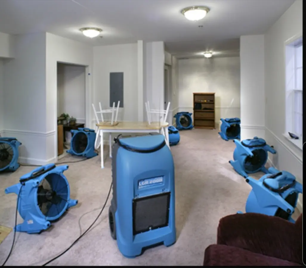 Air movers and dehumidifier setup for Water Damage Restoration in Woods Creek